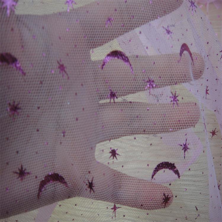 Fabricante de suministro de estrellas y luna tela de malla estampado de oro ropa infantil tela de escenario