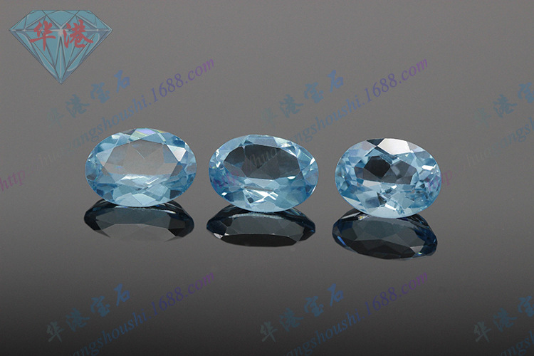 天然托帕石_华港宝石 伦敦蓝托帕石 蓝色椭圆