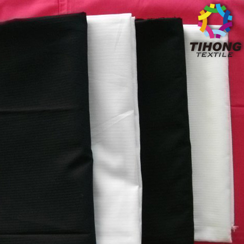 供应涤棉染色110*76 59/60寸口袋布里料条纹布箱包里布鱼骨纹面料