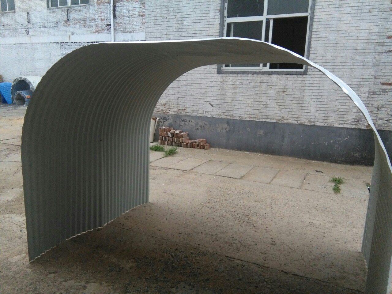 供应加工弧形波纹板  彩钢板压型  0.4--3.0毫米厚