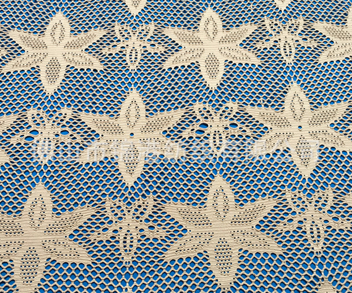 现货供应纬编涤纶提花布大枫叶镂空披肩比基尼连衣裙面料镂空设计