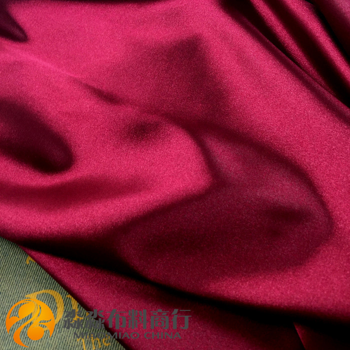 高端睡衣布料 酒红色缎面韧性仿真丝色丁 亮面背景娃衣装饰面料