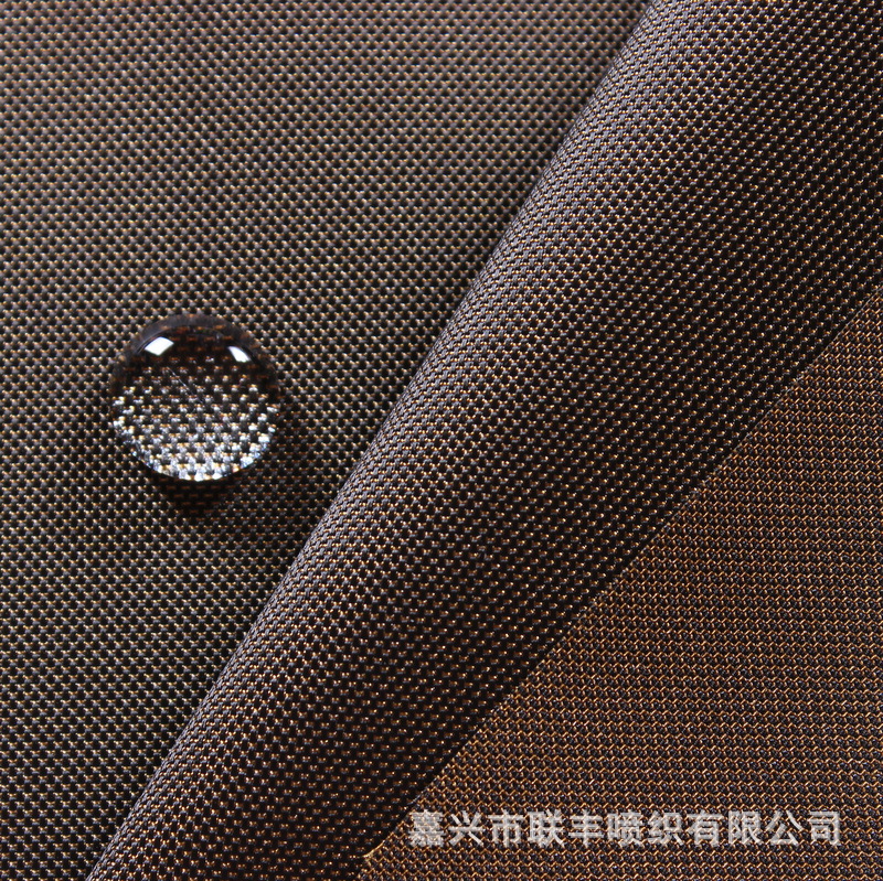 厂家直销经纬加捻黑白丝猫眼牛津仿记忆 套装休闲服夹克时装面料