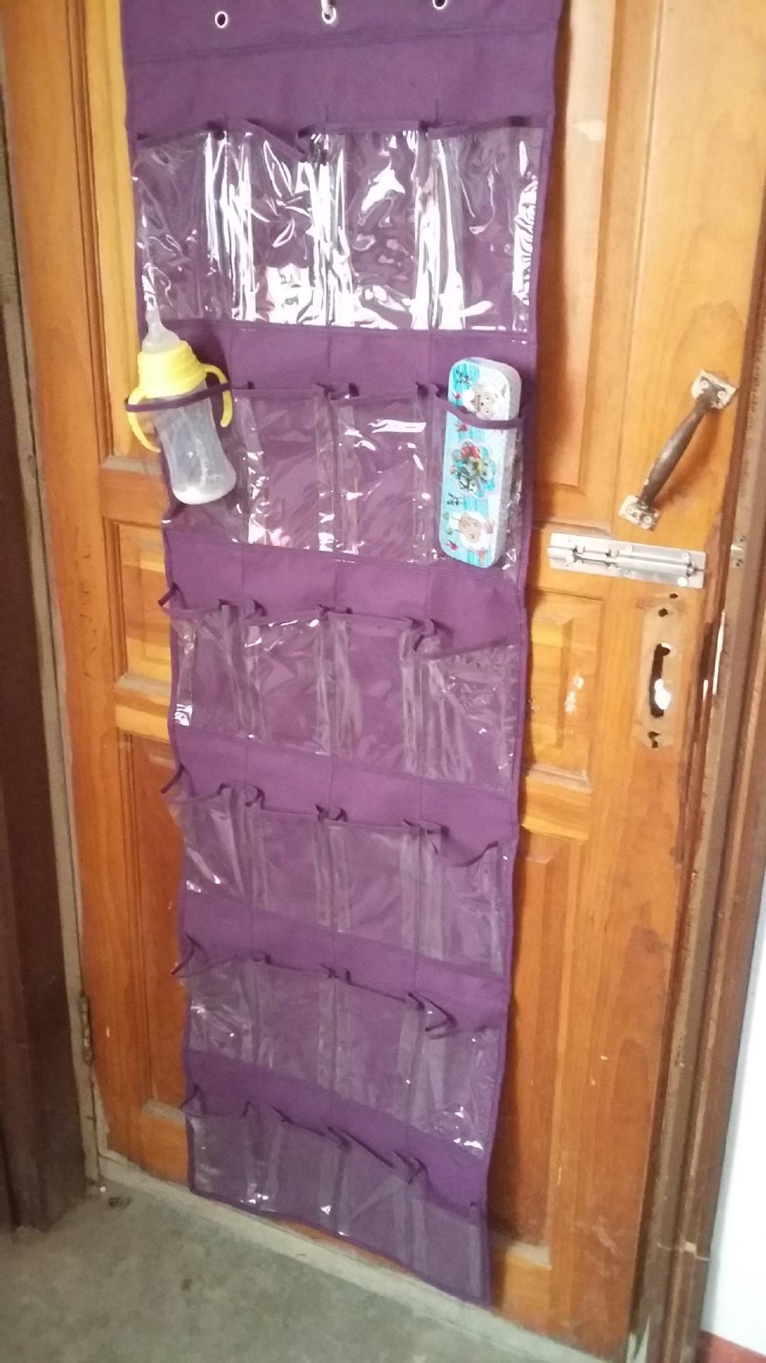 Transfronterizo dedicado PVC puerta del hogar bolsa colgante bolsa de almacenamiento de zapatos 24 rejilla de tela no tejida bolsa colgante de almacenamiento al por mayor