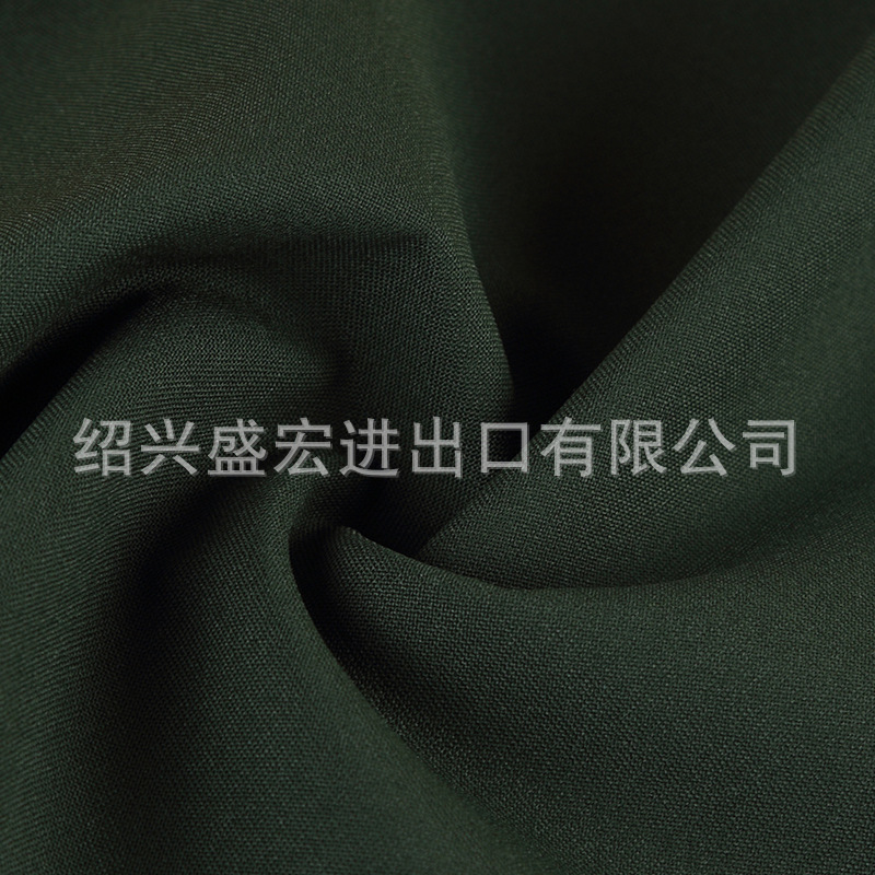 现货 新款毛涤贡丝锦  春夏款交通制服面料斜纹TR哔叽  活性染色