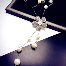 韓國時尚個性花朵珍珠水晶項鏈女 長款毛衣鏈百搭掛件女裝批發
