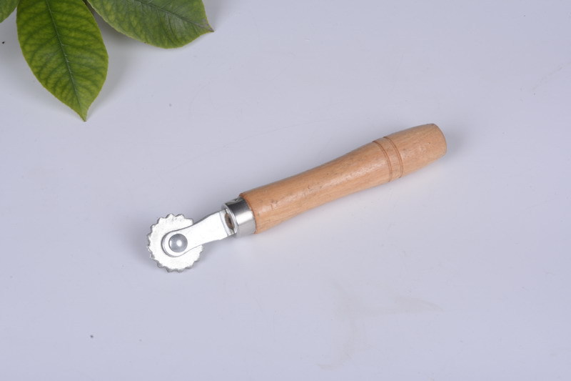 木把齿轮埋线器