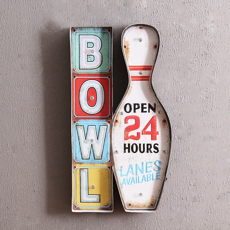 Граница- transcending? Но надо перевести: "Cross-border e-commerce new supply bowling wall wall decoration LED light iron wall decoration home coffee bar iron painting"