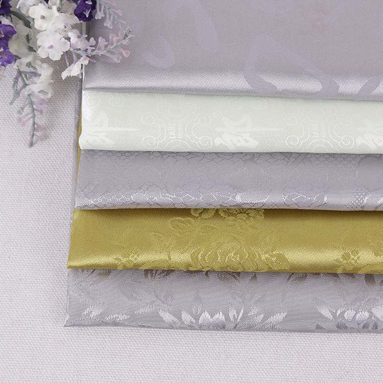 柯桥厂家供应 现货供应全涤提花布色丁提花布里布 女装连衣裙面料