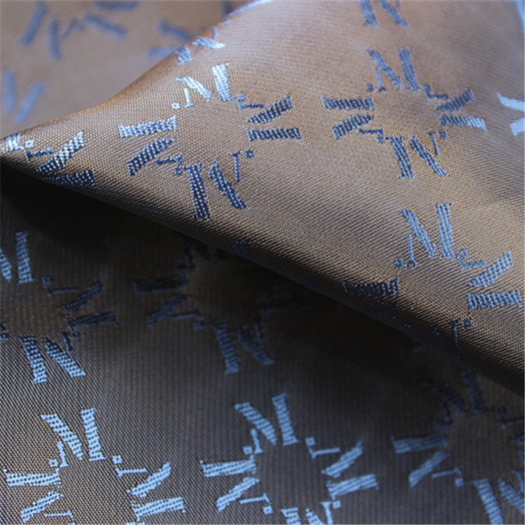 MAXMARA服装里料英文字母提花里布 涤粘提花布