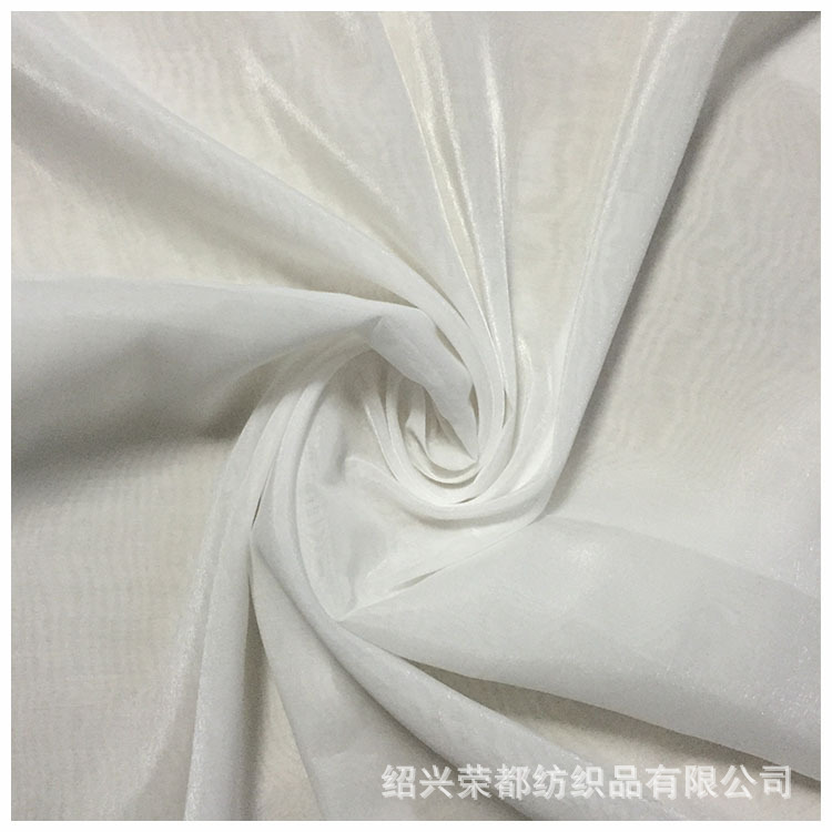 现货供应欧根纱 婚纱面料2020透风女装面料涤纶欧根纱面料