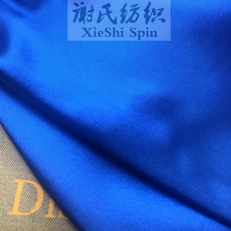 现货批发睡衣布料缎宝蓝色面韧性仿真丝色丁亮面背景娃衣装饰面料