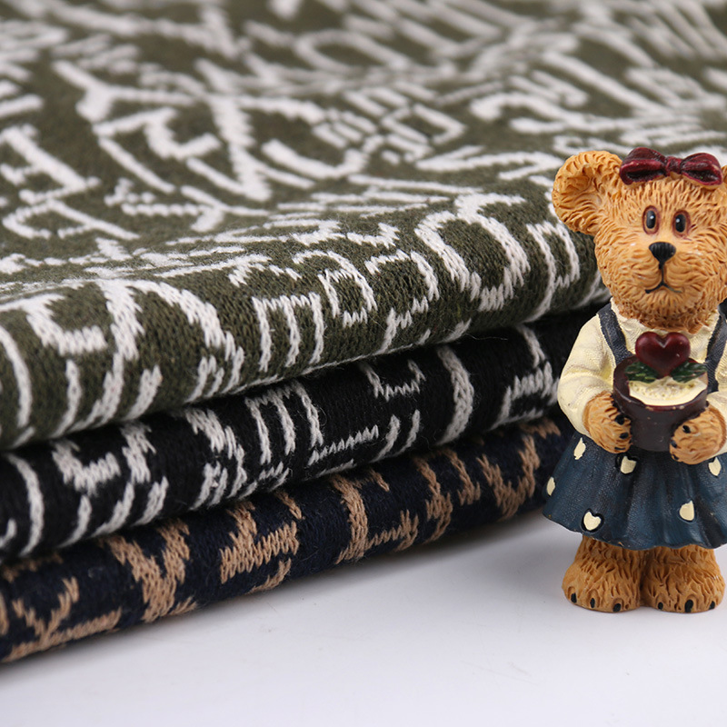 男女休闲潮流英文字母提花布服装面料 柯桥实体门市部现货批发