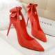3168-1 Korean version sweet beauty high-heeled shoes thin heels show thin high-heeled suede shallow mouth pointed hollow bow single shoes