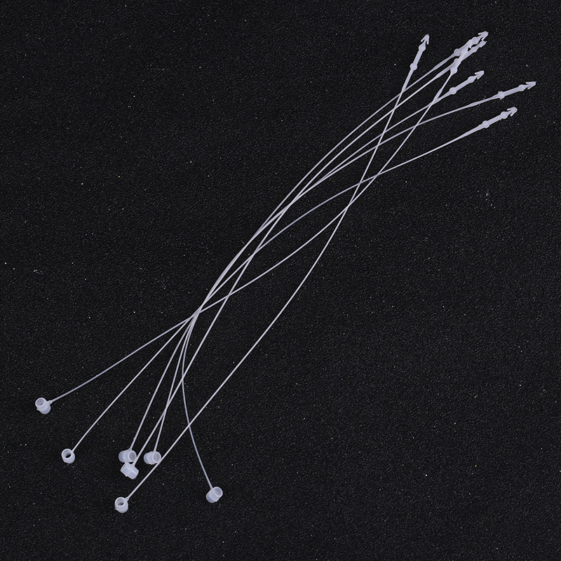 现货供应新款子母扣束线带珠针服装商标子母扣胶针索带一件代发