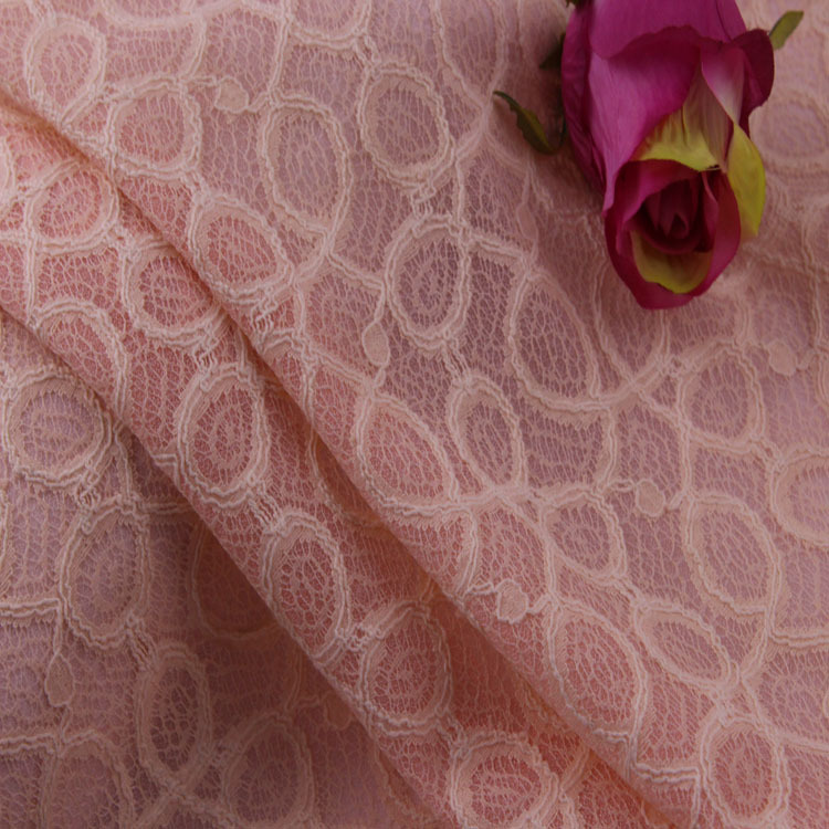微弹粉色涤棉复合蕾丝布料春秋针织服装羽绒服面料现货批发