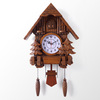 Qiaohu hanging clock living room creative hanging clock imitation wood clothing bird hanging bell out of the window report