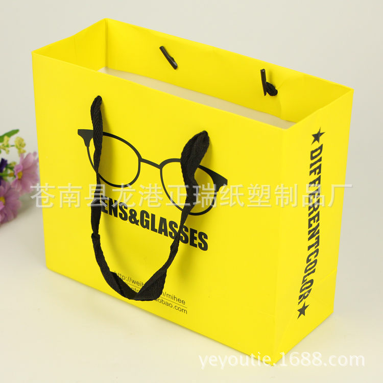 现货供应白卡纸手提纸袋  眼镜纸袋 小黄袋 礼品袋纸袋定做