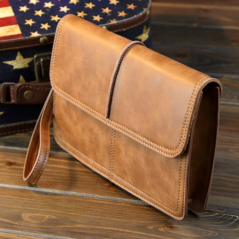 Manufacturers directly supply PU Leather Men's bag leisure men's hand bag fashion trend Korean version bag men's large capacity clip bag