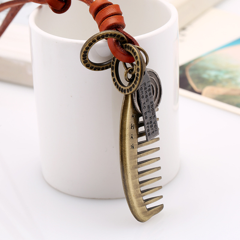 Vintage Alloy Comb Leather Rope Pendant Leather Necklace Sweater Chain display picture 2
