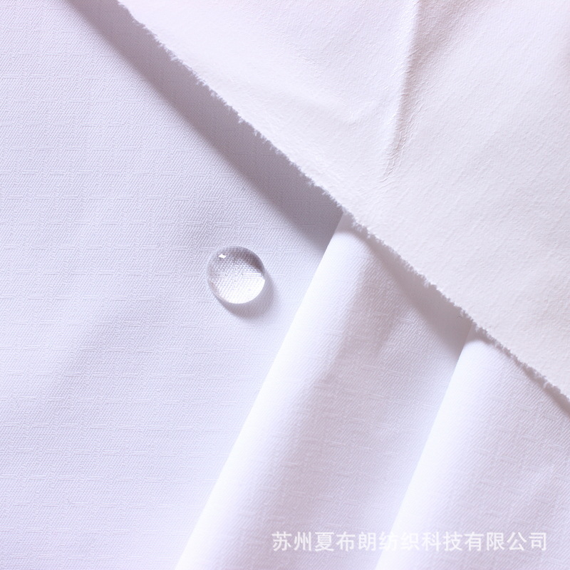优质供应320T春亚纺提花复合中透乳白膜防水透气户外冲锋衣面料