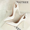 Korean version sexy thin high heels thin heels shallow mouth pointed patent leather hollowed out back bow single shoes