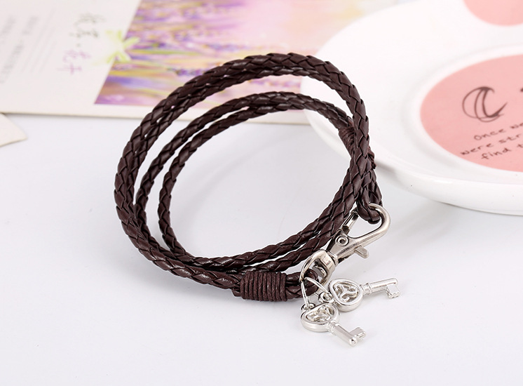 Fashion New Hand-woven Ethnic Style Leather Bracelet Retro Alloy Key Bracelet Bangle display picture 3