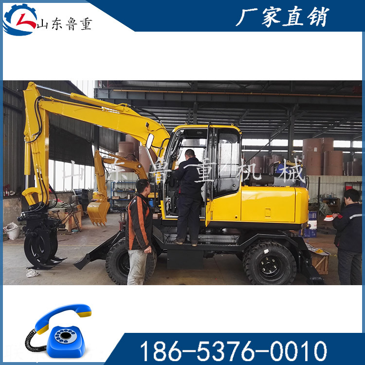 SD90 型专业轮胎式多功能抓木机 抱石头 正在