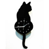 Factory wholesale creative cartoon wall clock will move the tail of the tail of the cat's cat hanging clock, the living room is simple