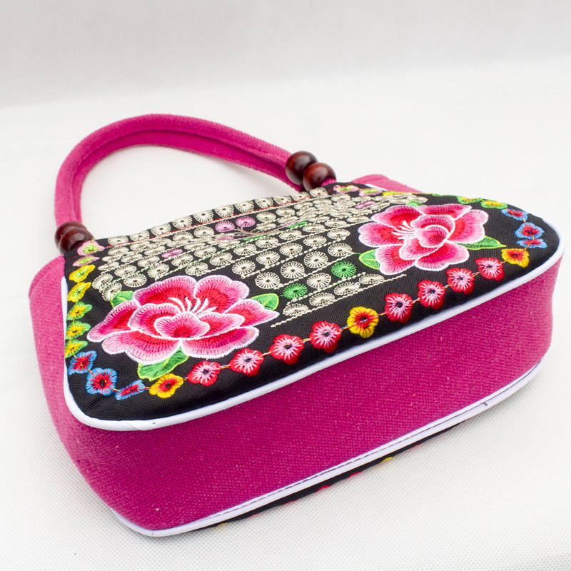 Directo de fábrica nuevo estilo étnico bordado bolsa cobre moneda flor pequeño bolso Yunnan bordado bolso especial Miao bordado bolsa