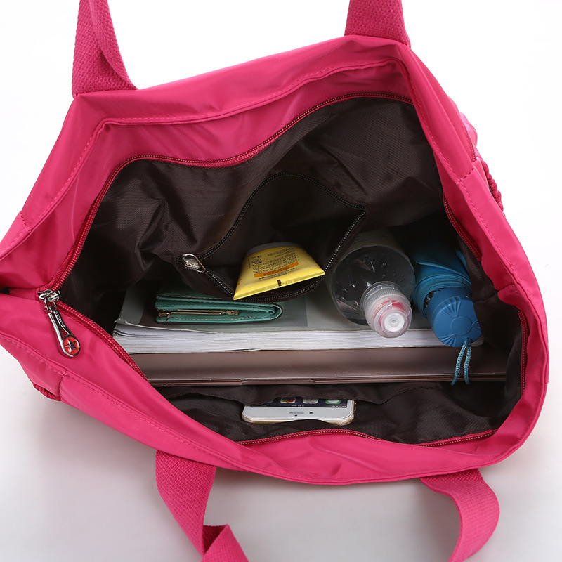 Transfronterizo 2021 primavera e invierno nuevo bolso de hombro de mujer bolso de nylon de gran capacidad bolso de momia de color sólido multifuncional