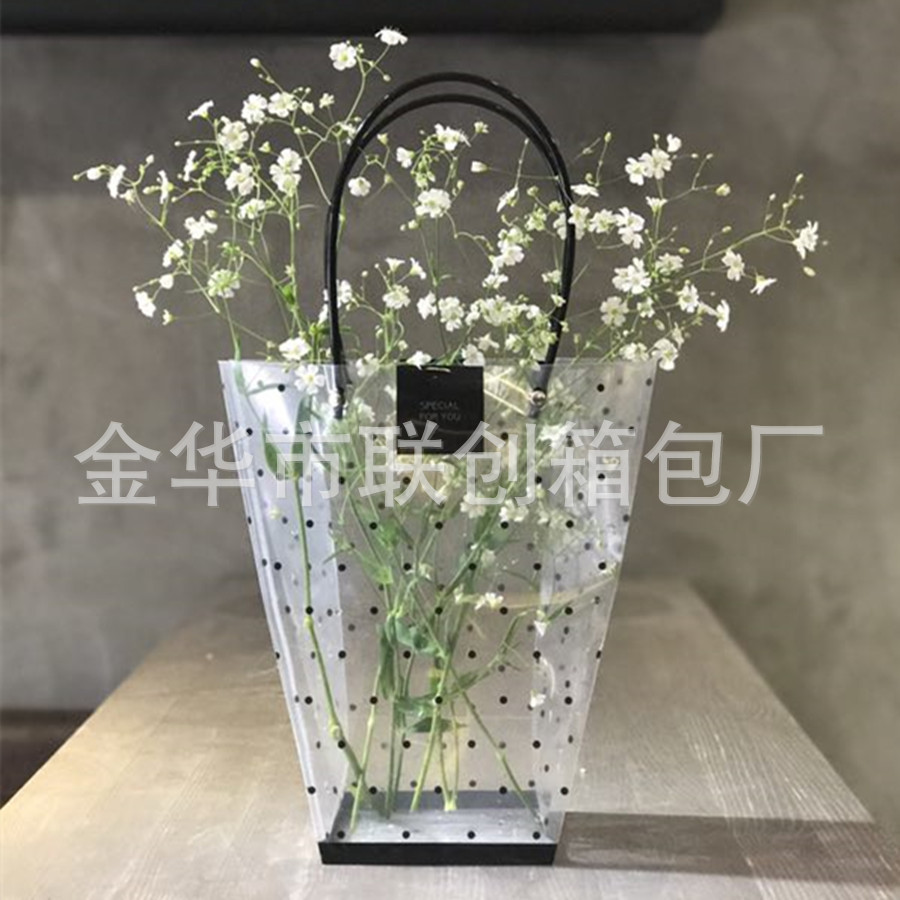 厂家批发零售：黑，白色圆点透明鲜花袋 pp梯形透明袋 礼品手提袋