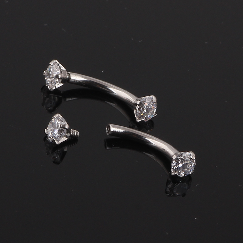 Silver pointed spike labret stud material detail