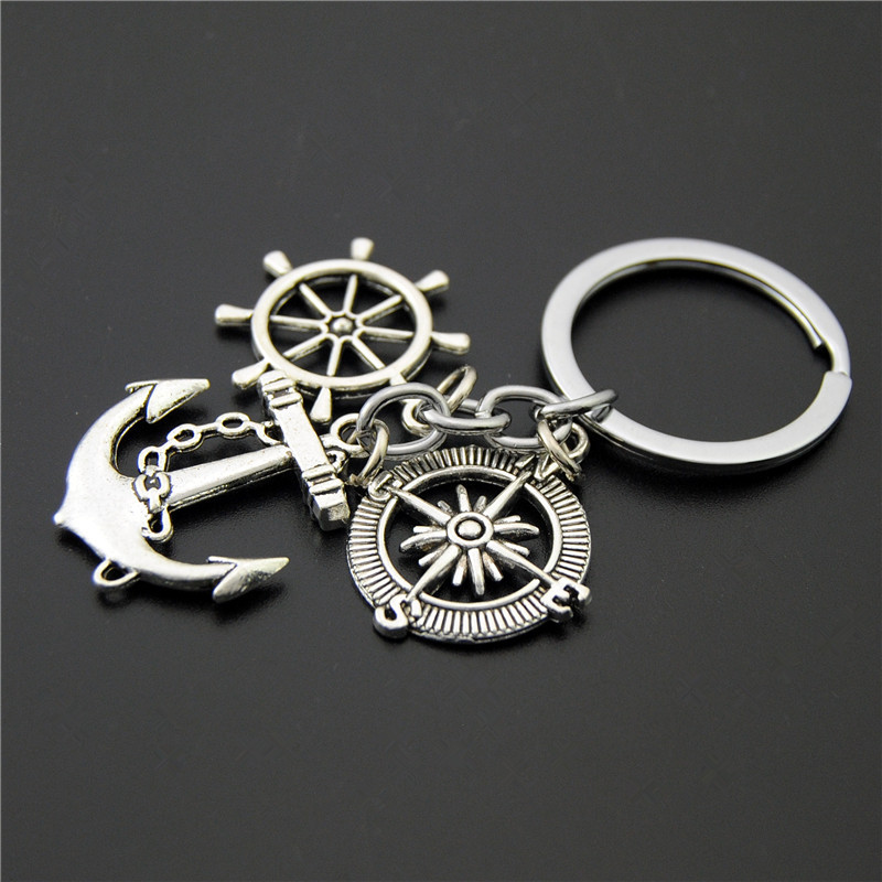Fashion Round Letter Airplane Alloy Keychain display picture 1