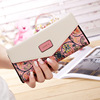 2023 new Korean version of the pastoral floral floral diamond contrasting color envelope with three folding folding folded cockle long ladies wallet