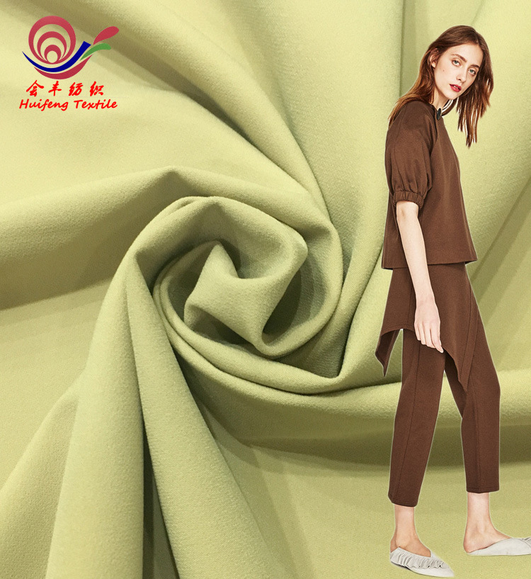 布料现货批发 梭织棉锦混纺加厚四面弹 春冬高档时装裤子面料