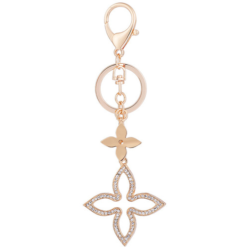 Yiwu small jewelry Korean version creative four-leaf clover car keychain pendant fashionable and exquisite women's bag pendant wholesale
