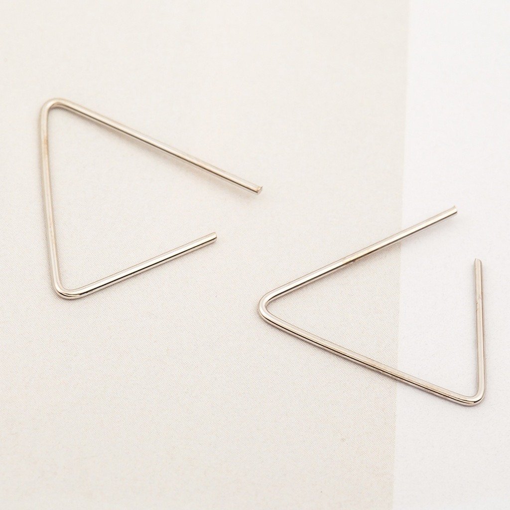 Simple Geometric Open Triangle Stud Earrings Gold Plated Silver Black Studs Wholesale display picture 12