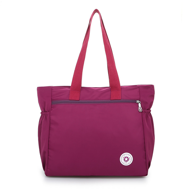 Transfronterizo 2021 primavera e invierno nuevo bolso de hombro de mujer bolso de nylon de gran capacidad bolso de momia de color sólido multifuncional