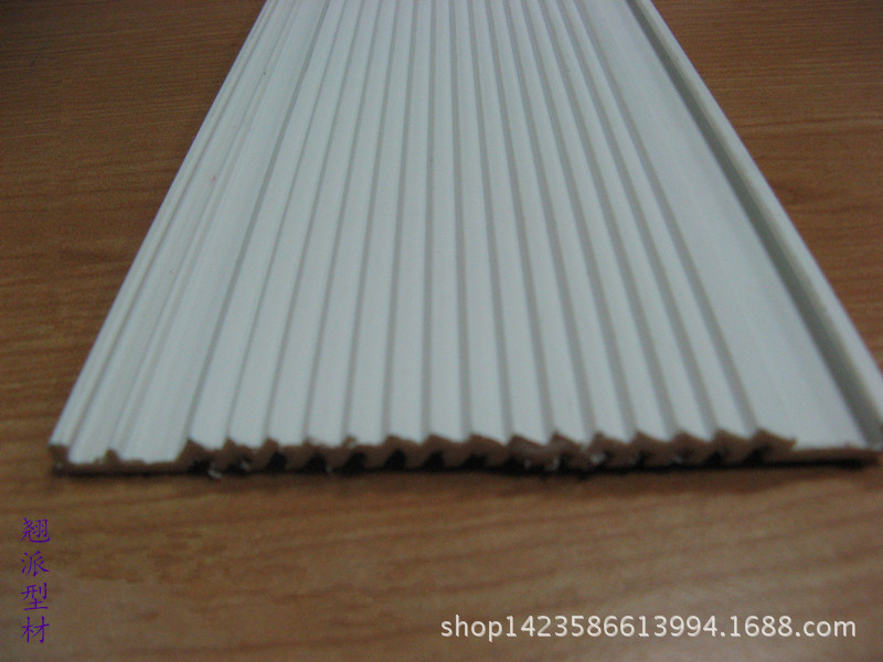 专业生产厂家生产各种形状不同颜色的PVC挤出型材-建材装饰板