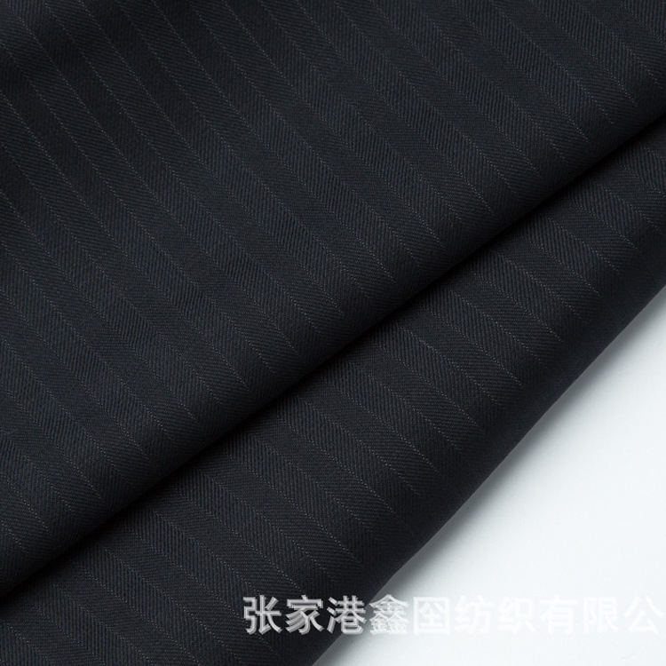XG31089/217精纺毛涤花呢 纺织面料厂家 精纺哔叽面料