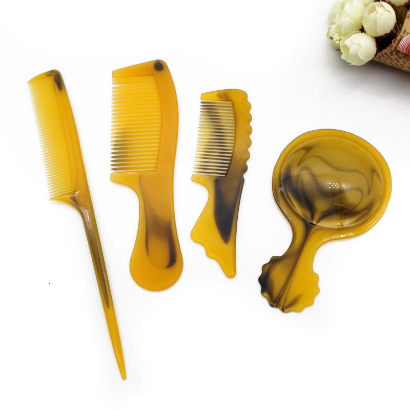 A2244 316 four -piece combing combed horn combed plastic combed combed Yiyu 2 yuan store department store wholesale