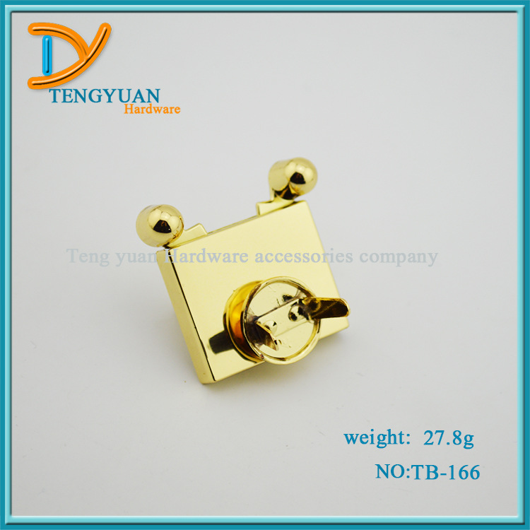 厂家直销 箱包五金配件锁扣 高档女包装饰按钮锁 浅金现货 可定