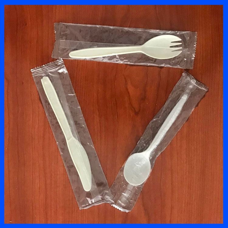 【快消品包装机】卢龙县餐具勺子枕式包装机 航空用品枕式包装机