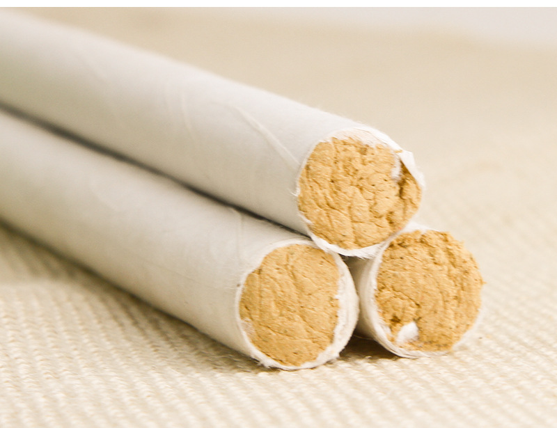 35:1 Golden Moxa Stick Ai Tiao 5-Year Aged Mugwort Moxibustion Roll 1.8x20cm 16g White Cotton Paper in use