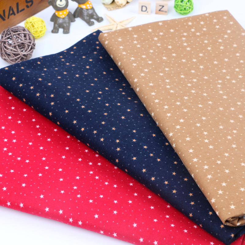 全棉印花星星面料 梭织磨毛法兰绒 连衣裙面料 一米起售