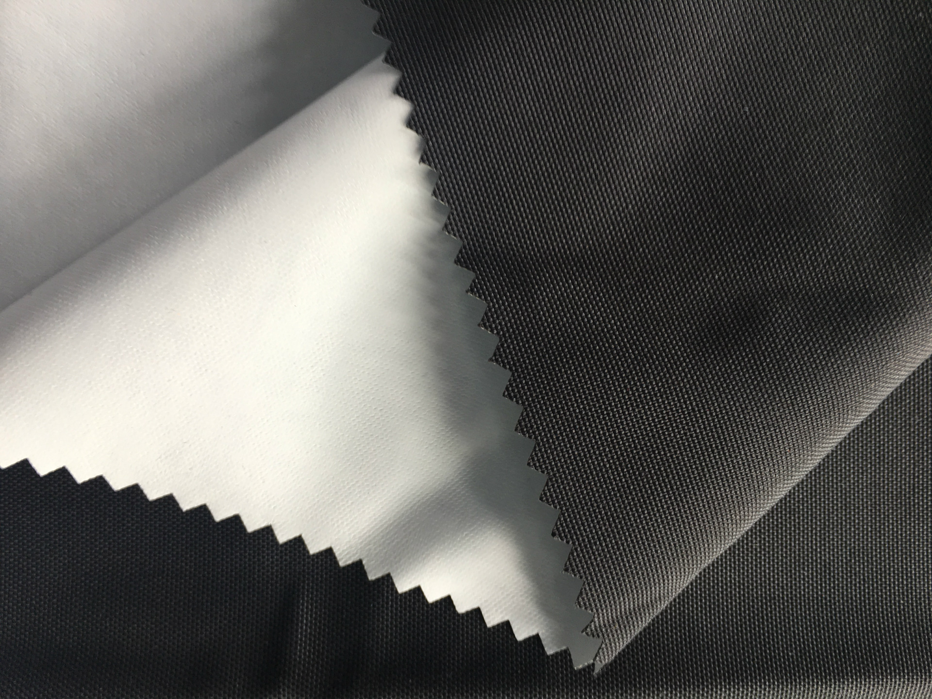 骑行服雨衣布料 tpu复合布塔丝隆面料透气复合雨衣面料