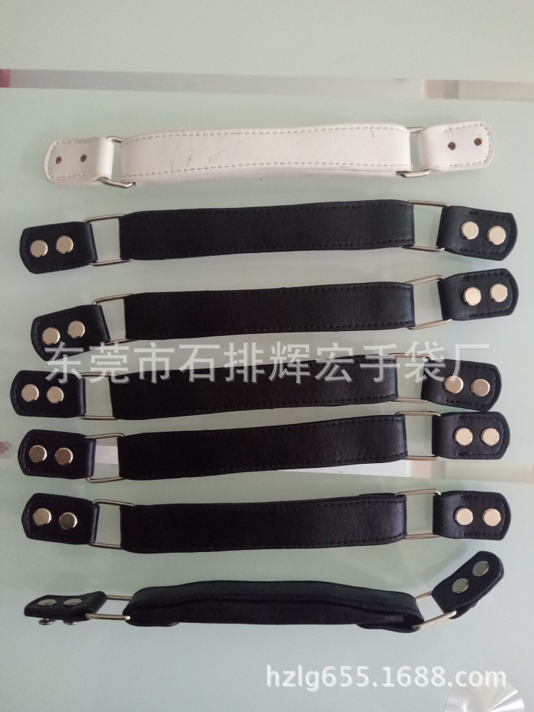 东莞手袋厂生产PU皮超纤皮真皮皮手提带皮手挽带行李箱包皮提手带