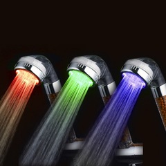 LED temperature control three-color seven-color pressure-regulating water-saving negative ion shower head handheld shower set wholesale