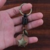 Retro bronze keychain handmade, fashionable trend pendant, genuine leather, wholesale